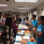 Students visiting the resource tables and networking